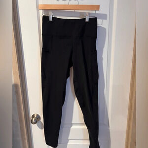 Willit sz small solid black leggings. Sid’s pockets and back zipper pocket.